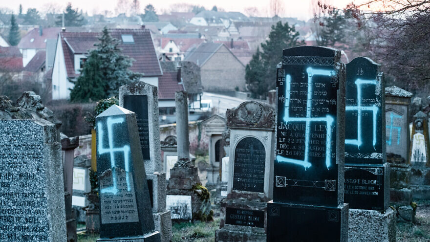 Swastikas graffitied on a Jewish cemetery in Quatzenheim near Strasbourg, France. Credit: Hadrian/Shutterstock.