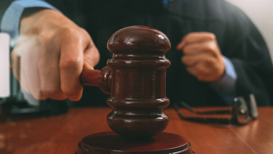 A concept picture of judge and gavel. Credit: everything possible/Shutterstock.