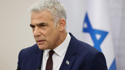 Israeli Foreign Minister Yair Lapid speaks during a faction meeting at the Knesset on Feb. 7, 2022. Photo by Olivier Fitoussi/Flash90.