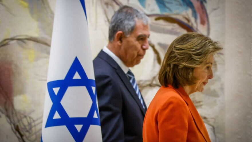 US Speaker of the House Nancy Pelosi walk with Knesset Speaker Mickey Levy after a joint statement at the Knesset, the Israeli Parliament in Jerusalem, February 16, 2022.  Photo by Olivier Fitoussi/Flash90