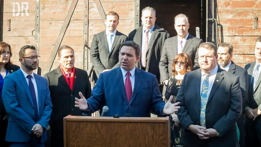 Florida Gov. Ron DeSantis speaks outside a display of a replica railroad cattle car used during the Holocaust on display outside of Tallahassee, Feb. 10, 2022. Source: Ron DeSantis/Twitter.
