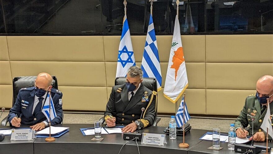 Maj. Gen. Tal Kelman (left), head of the Strategic Planning and Cooperation Directorate, takes part in a trilateral meeting with Greece and Cyprus, February 2022. Credit: IDF Spokesperson's Unit.