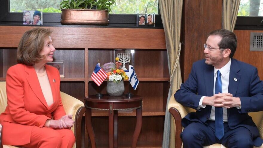 U.S. Speaker of the House Nancy Pelosi with Israeli President Isaac Herzog in Jerusalem. Feb. 16, 2022. Credit: Amos Ben-Gershom/GPO.