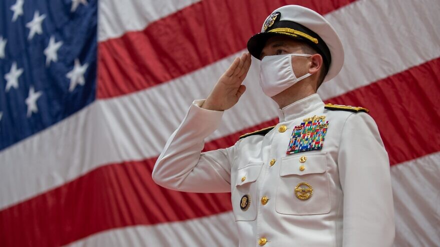 U.S. Vice Adm. Brad Cooper salutes during a change of command ceremony for U.S. Naval Forces Central Command, May 4, 2021. Credit: U.S. Fifth Fleet, CMF Change of Command Photo by Mass Communication Specialist 1st Class Daniel Hinton. via Wikimedia Commons.