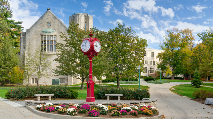 Landmark campus clock and logo on the campus of the University of Indiana. Credit: Ken Wolter/Shutterstock.