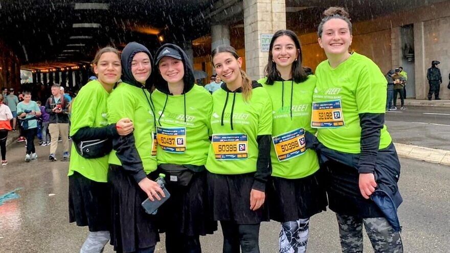The 70 passionate and proud members of the ‘ADI Fleet’ running team braved the freezing rain and muddy Jerusalem streets to raise awareness for ADI at the 2022 Jerusalem Marathon on Friday, March 25.