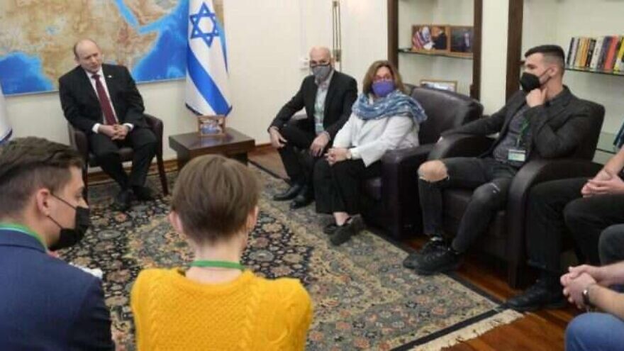 Israeli Prime Minister Naftali Bennett meets with Ukrainian participants in the Masa Israel Journey program at Defense Ministry headquarters in Tel Aviv, March 1, 2022. Credit Amos Ben Gershom/GPO.