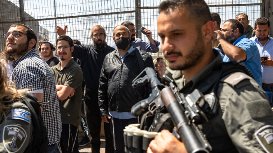 Jerusalem city council member Aryeh King (center, with black mask) visits at the Beit Orot yeshiva on the Mount of Olives in Jerusalem, April 26, 2021. Photo by Olivier Fitoussi/Flash90.