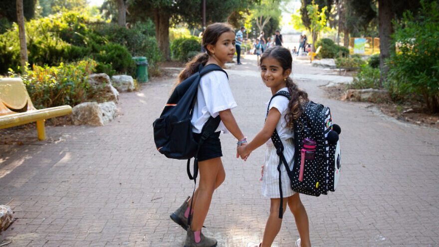 Israeli children make their way to school in Jerusalem on the first day of the new academic year, Sept. 1, 2021. Photo by Olivier Fitoussi/Flash90.