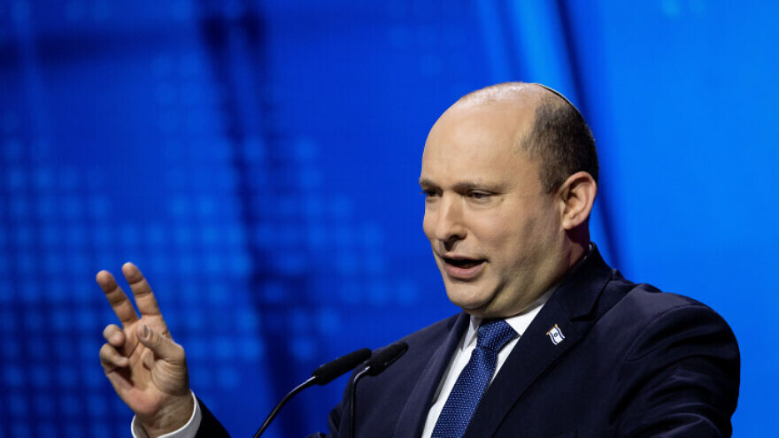 Israeli Prime Minister Naftali Bennett speaks at a conference of the Israeli Television News Company in Jerusalem on March 7, 2022. Photo by Yonatan Sindel/Flash90