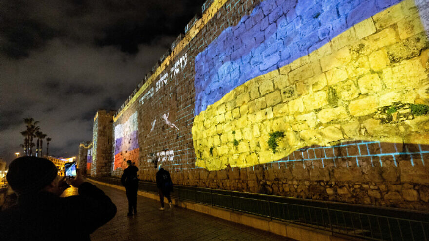The flags of Ukraine and Russia screened on the walls of Jerusalem's Old City on March 13, 2022. Photo by Yonatan Sindel/Flash90.