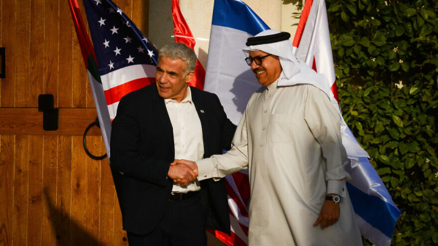 Then-Israeli Foreign Minister Yair Lapid welcomes Bahrain Foreign Minister Abdullatif bin Rashid Al Zayani as he arrives at the Negev Summit in Sde Boker, Israel, March 27, 2022. Credit: Flash90.