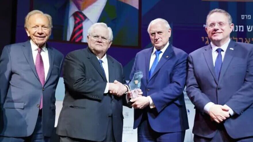 Pastor John Hagee (second from left) receives an award from the Menachem Begin Heritage Center. Photo by Hanna Taieb.