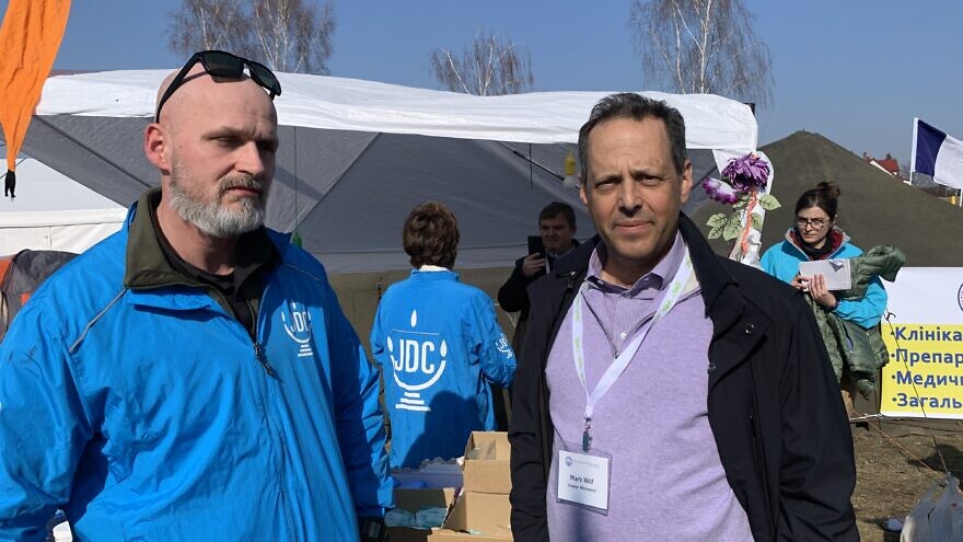 Mark Wilf (right), chair of the JFNA board of trustees, on the Poland-Ukraine border. Credit: Jewish Federations of North America.