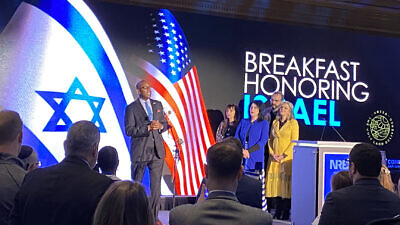 Pastor Lyndon Allen sings “Hatikvah” at the Breakfast Honoring Israel at the National Religious Broadcasters convention in Nashville on March 10, 2022. Credit: Larry Brook/Israel InSight.