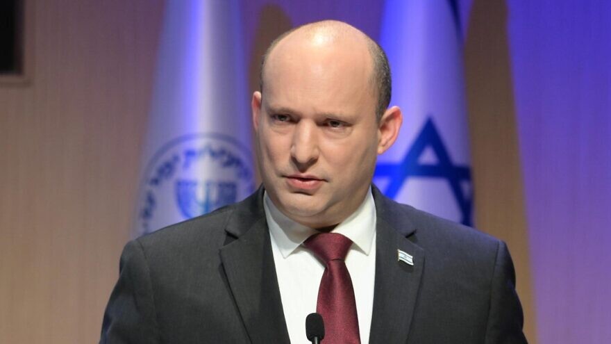Israeli Prime Minister Naftali Bennett delivers an address at the Mossad headquarters in Tel Aviv, on March 1, 2022. Credit: Amos Ben Gershom/GPO.