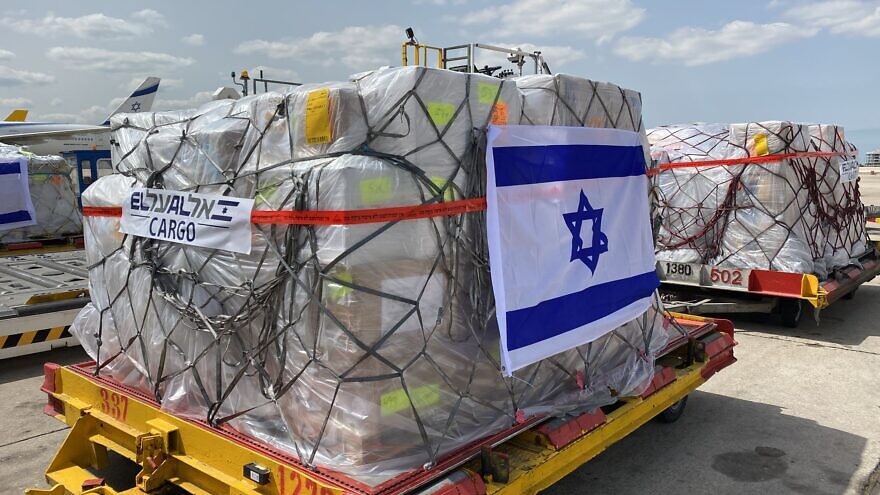 Tons of equipment for a field hospital in Ukraine is loaded onto an El Al plane, March 17, 2022. Credit: Sivan Shahor, Anava / GPO.