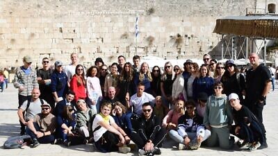 Jews from the former Soviet Union, participants in a Masa Israel Journey program, at the Western Wall in Jerusalem. Credit: Courtesy.