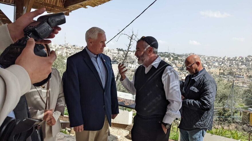 Yishai Fleisher, international spokesperson for the Jewish community of Hebron, gives former Vice President Mike Pence a tour of the city on March 9, 2022. Credit: Courtesy.