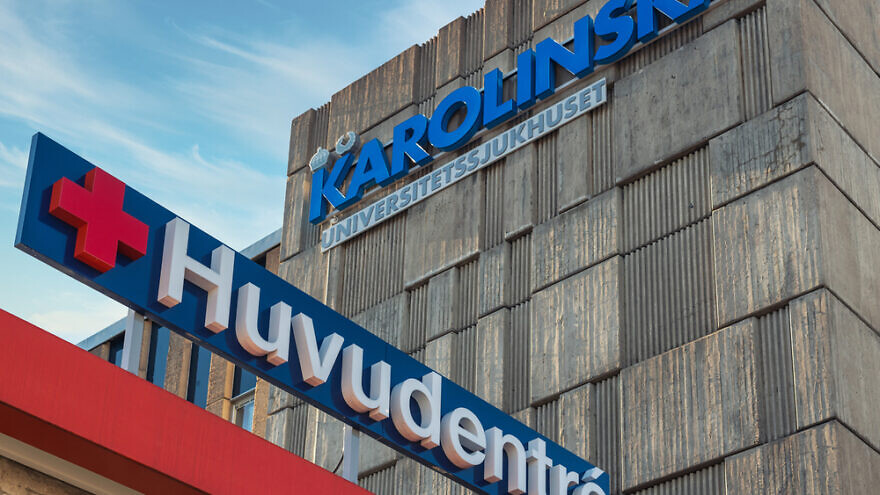 Closeup of entrance sign at Karolinska Hospital. Credit: Stefan Holm/Shutterstock.