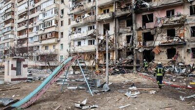 A residential building damaged by Russian aircraft in the Ukrainian capital of Kyiv. Credit: Drop of Light/Shutterstock.