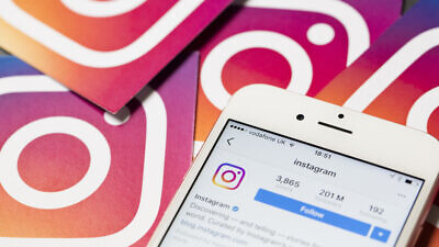 An apple iPhone showing the instagram application. Credit: Ink Drop/Shutterstock.