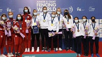 The junior women's fencing teams from Israel, Poland and the United States (gold, silver and bronze winners) at the 2022 Junior and Cadet Fencing World Championships in Dubai in the United Arab Emirates, April 2022. Source: Facebook.