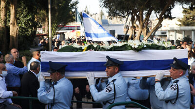 The funeral of Israel Police First Sgt. Amir Khoury, who died during a gun battle with a terrorist in Bnei Brak on March 29, at the cemetery in Nof HaGalil, March 31, 2022. Photo by David Cohen/Flash90.