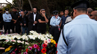 The funeral of Israel Police 1st Sgt. Amir Khoury, who was killed in a gun battle with a terrorist in Bnei Brak on March 29, at the Nof Hagalil cemetery, March 31, 2022. Photo by David Cohen/Flash90.