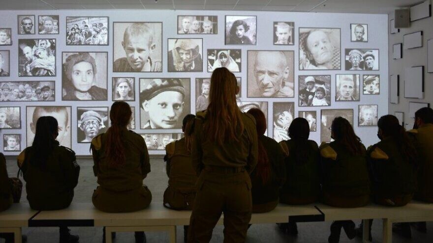 Israeli soldiers tour the new “Before My Very Eyes” exhibition at the Ariel Sharon Israel Defense Forces training campus in the Negev Desert. Credit: Yad Vashem.