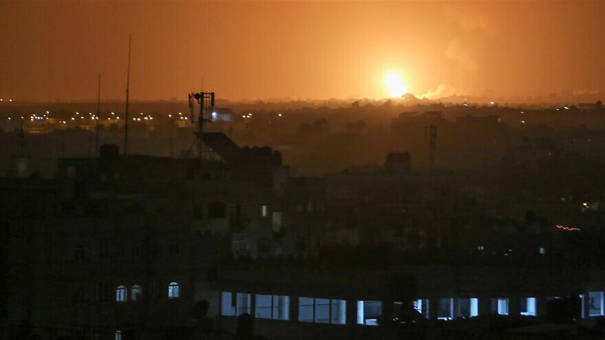 A ball of fire and smoke rises during an Israeli airstrike in Khan Yunis, in the southern Gaza Strip, on April 19, 2022. Photo by Abed Rahim Khatib/Flash90.