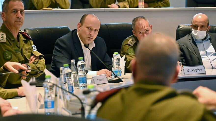 Israeli Prime Minister Naftali Bennett (second from left) holds a press conference with officers of the Israel Defense Forces, including IDF Chief of Staff Lt. Gen. Aviv Kochavi (to his left) at the Judea and Samaria Division IDF military base, near the settlement of Beit El, on April 5, 2022. Credit: IDF Spokesperson's Unit.