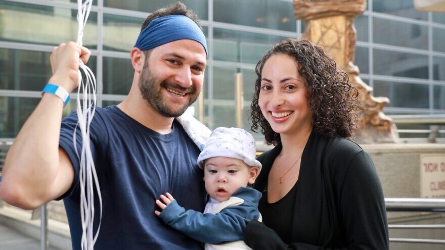 New immigrants Charley and Shaked Smith, and their baby son, Adar, on April 27, 2022. Photo by Yonit Schiller.