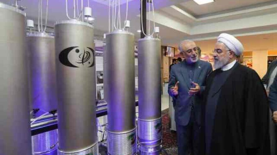 Ali Akbar Salehi, head of Iran’s Atomic Energy Organization, shows then-President Hassan Rouhani models of nuclear centrifuges, April 9, 2019. Credit: Iranian President’s Office.