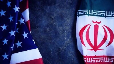 American and Iranian flags. Credit: Dmitriy Prayzel/Shtterstock.