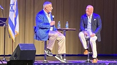 Auburn University men’s basketball coach Bruce Pearl (left) is interviewed by Aaron Fruh, founder of Israel Team Advocates International, at a “Night to Honor and Stand With the Jewish People” at Frazer United Methodist Church in Montgomery, Ala., on Oct. 21, 2021. Credit: Courtesy.