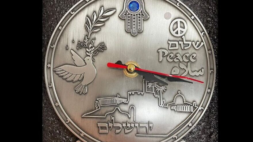 The "peace clock" shows religious images referencing Islam and Christianity but almost none specifically recalling the Jewish religion. Source: Facebook