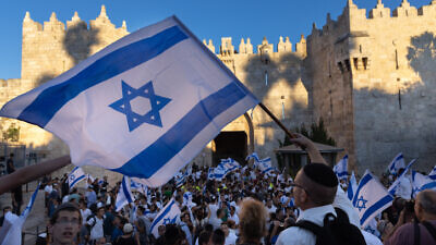 The Jerusalem Day flag march arrives at Damascus Gate in Jerusalem's Old City, June 15, 2021. Photo by Photo by Olivier Fitoussi/Flash90.