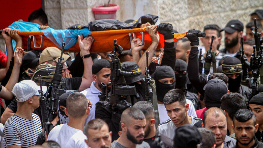 Armed members of Palestinian Islamic Jihad participate in the May 21, 2022, funeral of a Amjad Fayed, who was killed during a gun battle with Israeli forces in Jenin earlier in the day. Photo by Nasser Ishtayeh/Flash90.