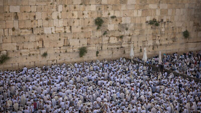Jews pray at the Western Wall in Jerusalem's Old City on Jerusalem Day, May 29, 2022. Photo by Yonatan Sindel/Flash90.