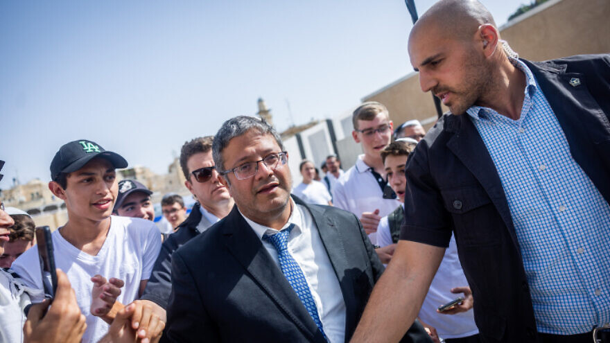 Right-wing politician MK Itamar Ben-Gvir maks his way to visit the Temple Mount through the the Mughrabi Bridge at the Western Wall in Jerusalem's Old City, during Jerusalem Day celebrations, May 29, 2022. Photo by Yonatan Sindel/Flash90.
