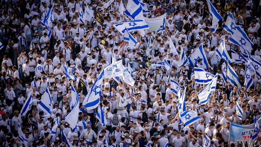 Thousands of Jews wave Israeli flags as they celebrate Jerusalem Day in downtown Jerusalem, May 29, 2022. Photo by Yonatan Sindel/Flash90