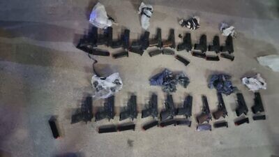 A shipment of handguns from Jordan intercepted by the Israel Police on May 1, 2022. Credit: Israel Police.