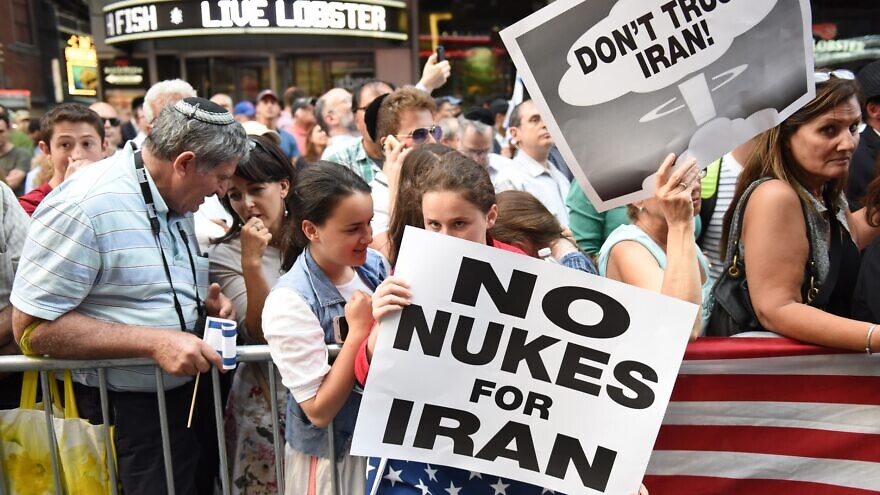 Thousands rally in New York City against appeasing Iran at the time of the first nuclear deal signed in 2015. Credit: A Katz/Shutterstock.