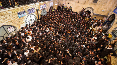 Crowds celebrate the holiday of Lag B’Omer in Meron on May 19, 2022. Photo by David Cohen/Flash90.