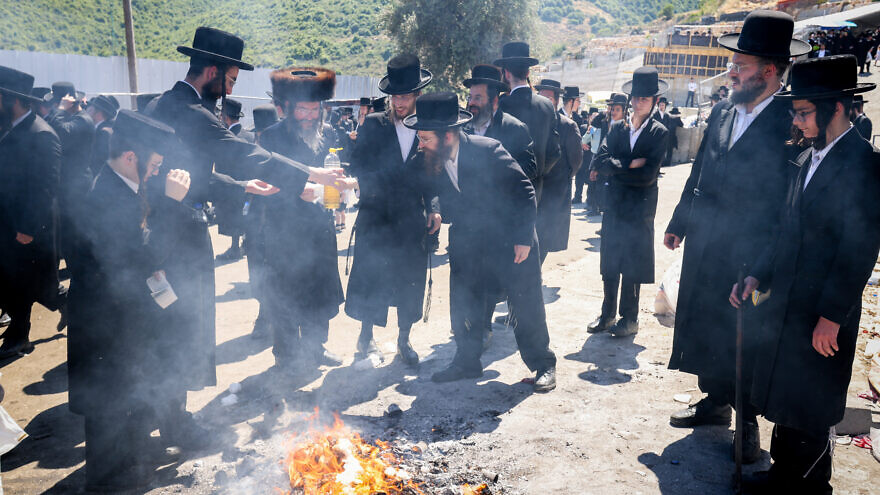 Smaller crowds celebrate the holiday of Lag B'Omer in Meron on May 19, 2022. Photo by David Cohen/Flash90.