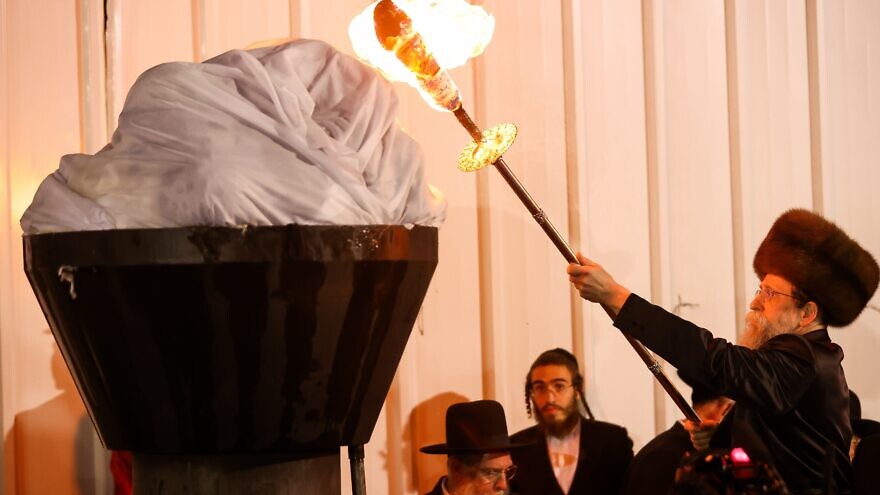 Grand Rabbi of Boyan (Chassidic dynasty) lights the bonfire during Lag B'Omer celebrations in Meron on May 18, 2022. Photo by David Cohen/Flash90.