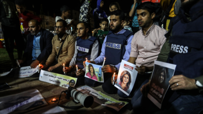 Palestinian journalists take part in a candlelight vigil in the Gaza Strip in memory of Al Jazeera reporter Shireen Abu Akleh, who was killed in Jenin during a firefight between terrorists and IDF soldiers. Photo by Abed Rahim Khatib/Flash90.