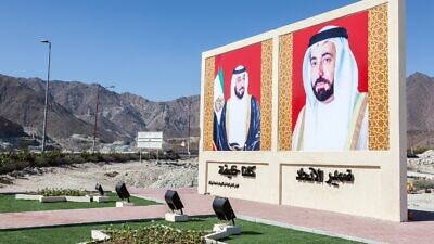 Portraits of United Arab Emirates President  Sheikh Khalifa bin Zayed Al Nahyan and Sheikh Mohammed bin Rashid Al Maktoum in Fujairah, UAE. Credit: Philip Lange/Shutterstock.