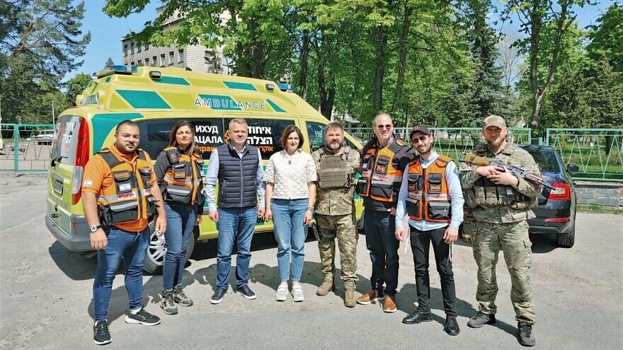 President and founder of United Hatzalah Eli Beer (third from right) with Parliament member for the city of Bucha, Ukraine, Olga Vasilevskaya-Smaglyuk (center), and team members who have been operating a group of ambulances and providing medical care throughout Ukraine, May 9, 2022. Credit: United Hatzalah.